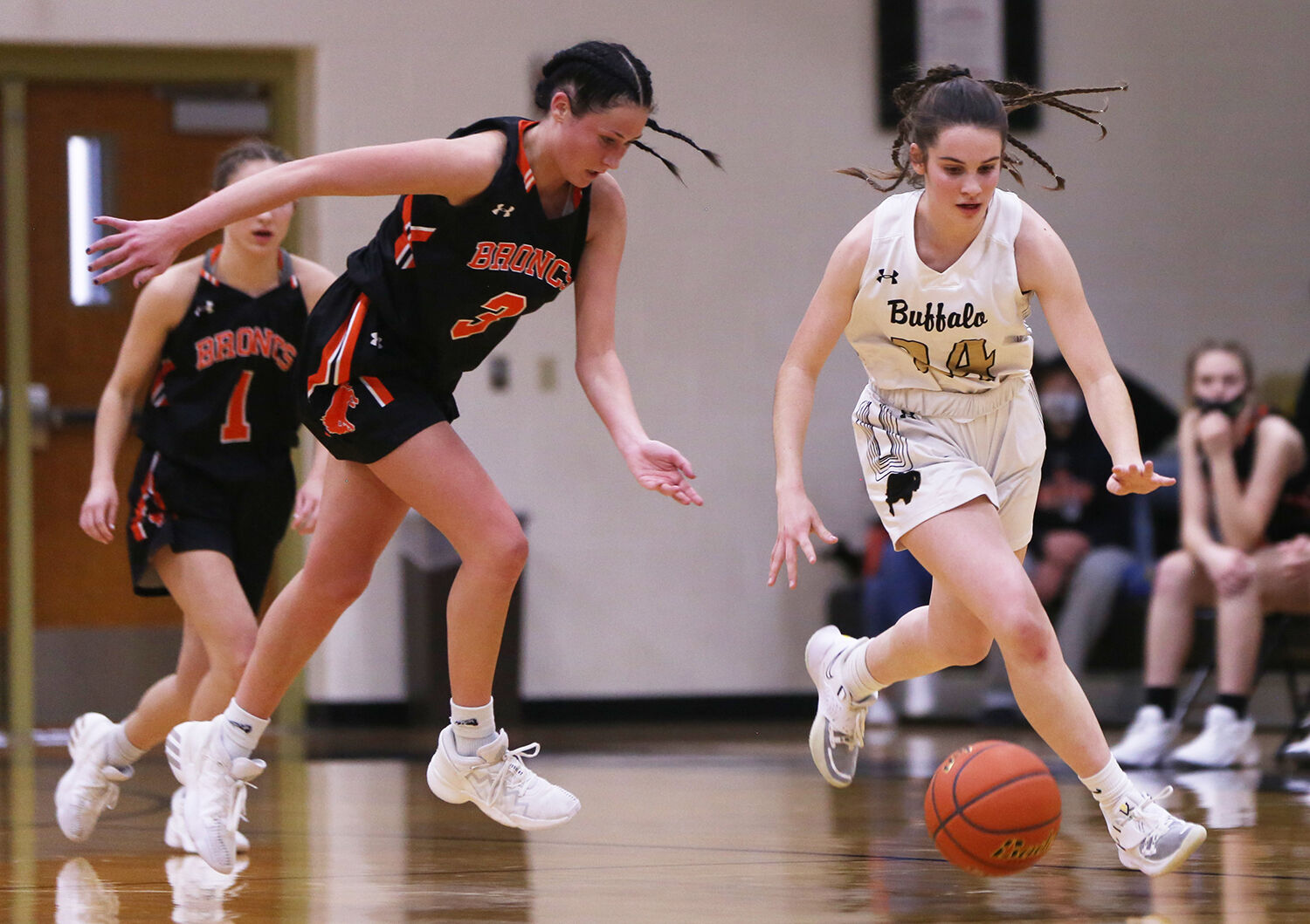 Cassidy Bessler steals the ball from Burns player